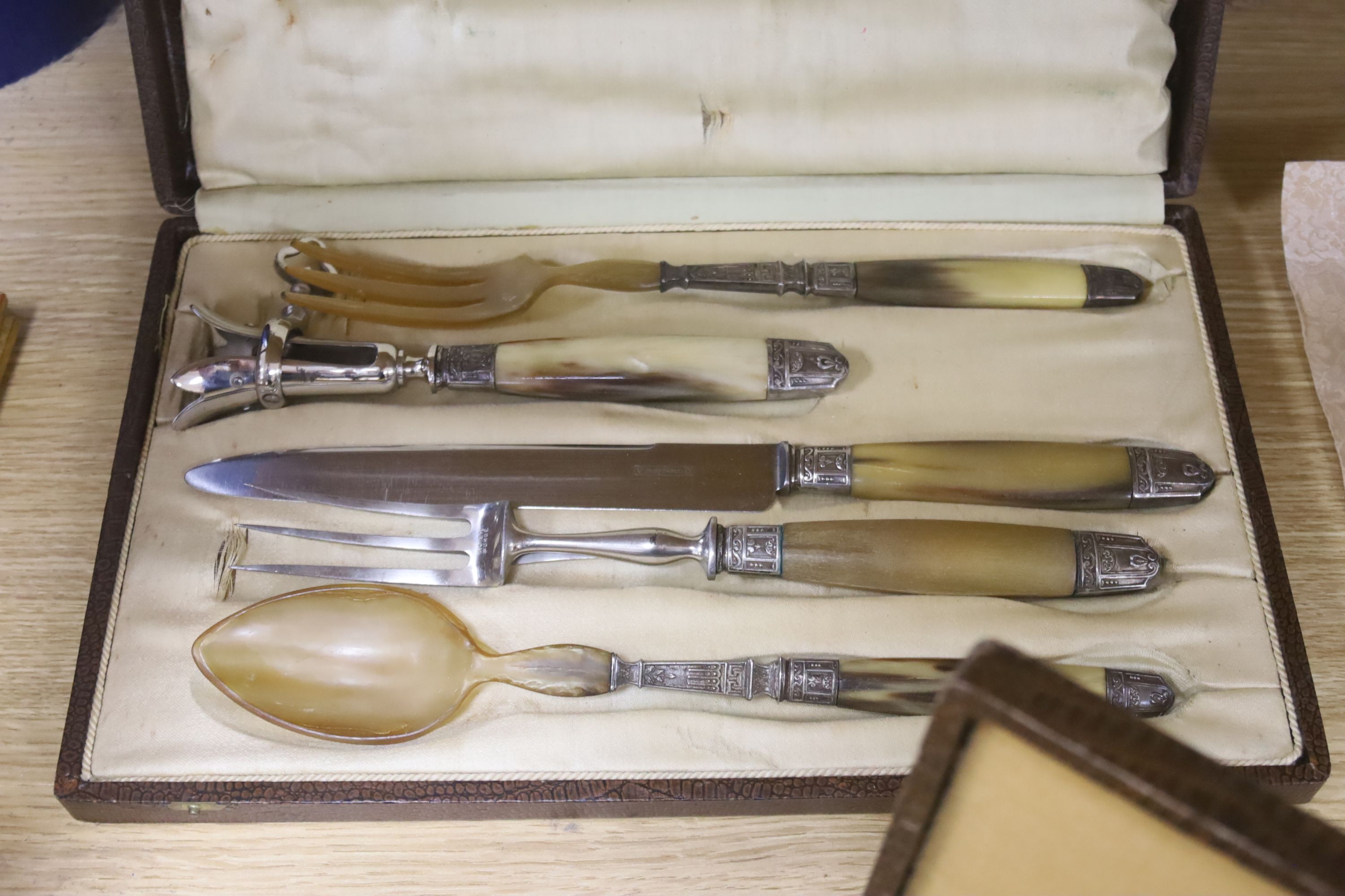 Three cased sets of horn handled flatware